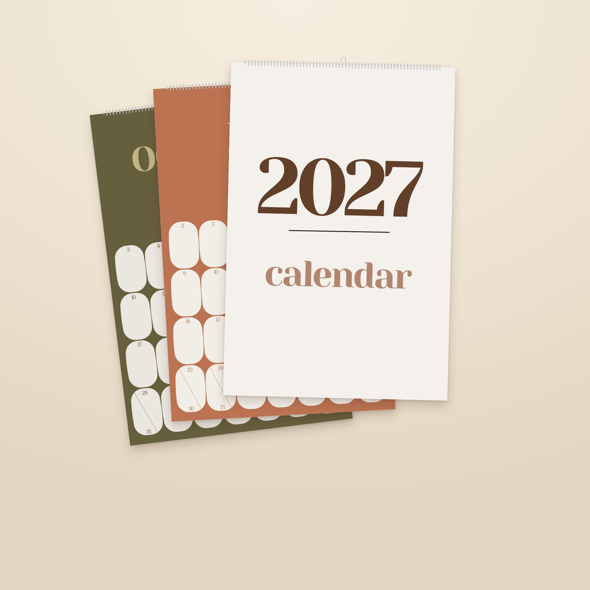 2027 Mid-Century Modern wall calendar, warm earth tones, cover with month pages behind