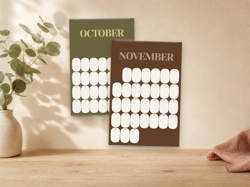 2027 Mid-Century Modern wall calendar, warm earth tones, October and November shown on a wall